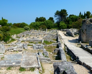 The-road-ran-north-to-south-through-the-center-of-Glanum-and-contained-a-water-conduit-for-carrying-away-rainwater-and-sewag The-road-ran-north-to-south-through-the-center-of-Glanum-and-contained-a-water-conduit-for-carrying-away-rainwater-and-sewag