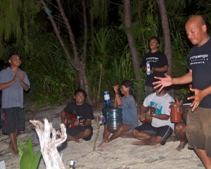AAII-crew-with-Dive-guides-Bram-clapping-anf-Made-on-left-playing-the-guitar AAII-crew-with-Dive-guides-Bram-clapping-anf-Made-on-left-playing-the-guitar